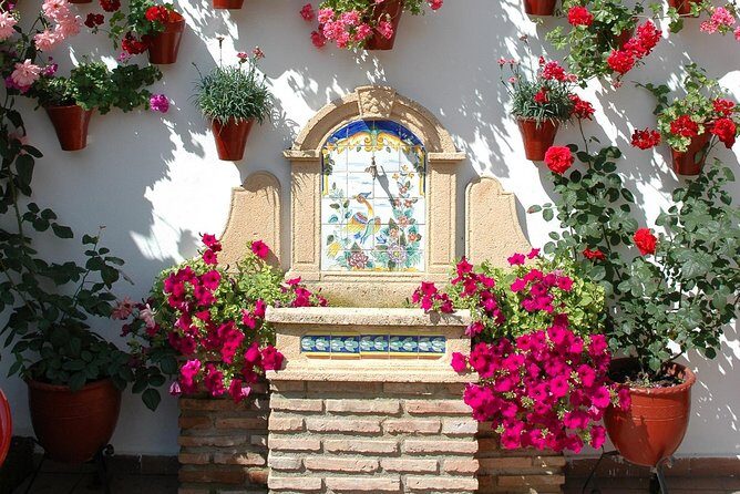 Authentic Patios of Cordoba Guided Tour - Stop 2: Patios de Córdoba—more gardens, plus the guide’s festival translation