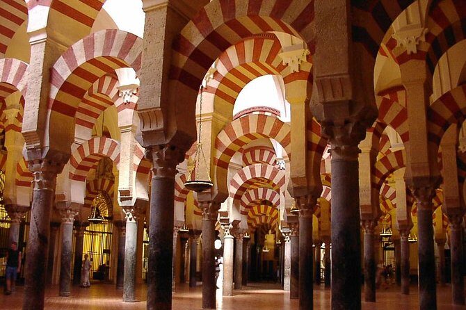 Private Tour of Cordoba Week Days 2 Hours Tickets included - Entering the Mezquita-Cathedral: columns, arches, and the mihrab